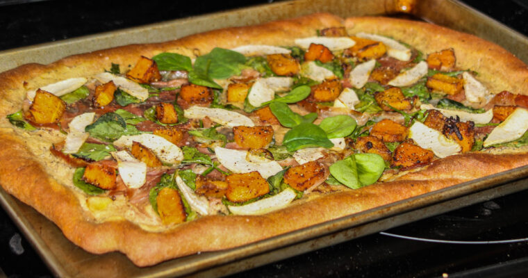 PIZZA WITH ROASTED SQUASH, CARAMELIZED ONIONS, AND APPLES